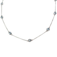 Collier d'occasion or 375 blanc maille fantaisie topazes sky blue