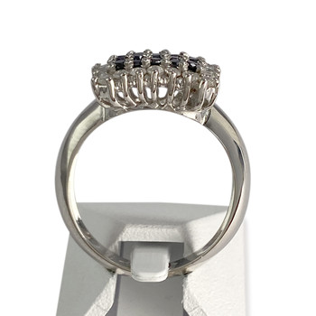 Bague d'occasion or 750 blanc avec diamants blancs et noirs traités