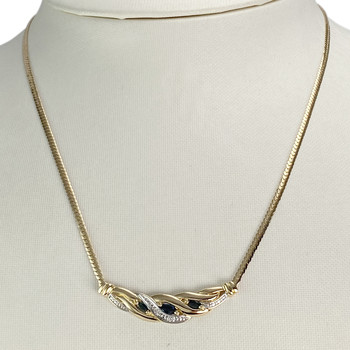 Collier d'occasion or 750  2 tons maille serpent diamants saphirs