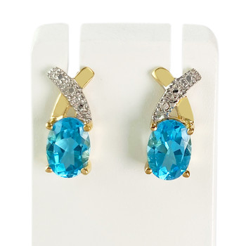 Boucles d'oreilles d'occasion 2 ors 750 topazes Swiss blue