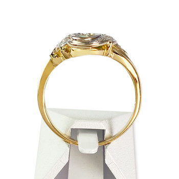 Pre-owned 18K two-tone gold ring with emeralds and diamonds