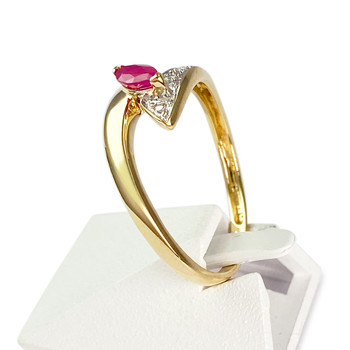 Bague d'occasion 2 ors 750 diamant, rubis