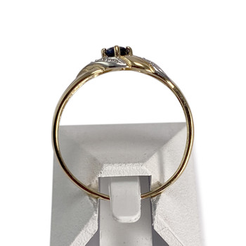 Pre-owned 750 two-tone gold ring with diamonds and a sapphire