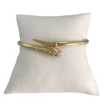 Tweedehands armband van 750 geelgoud met slangenmotief en robijnen