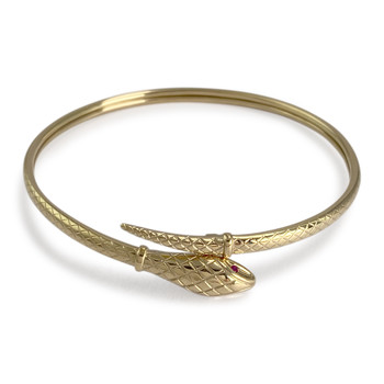 Tweedehands armband van 750 geelgoud met slangenmotief en robijnen