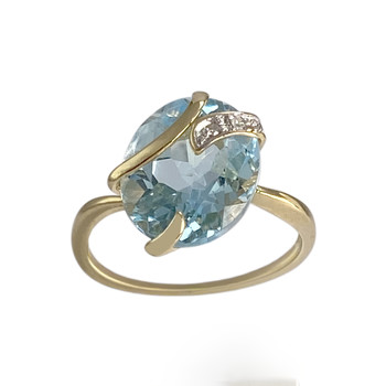 Pre-owned 18K two-tone gold ring with diamonds and a blue topaz