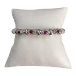 Bracelet d'occasion or 750 2 tons rubis, diamants - vue 1