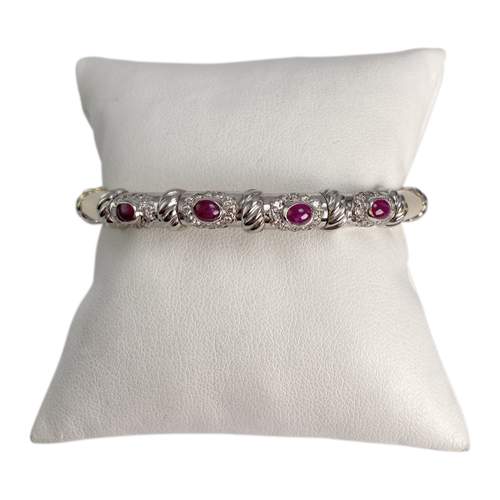 Bracelet d'occasion or 750 2 tons rubis, diamants