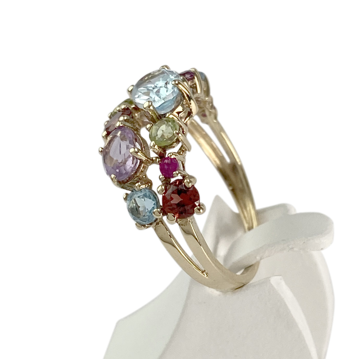Bague d'occasion or 375 jaune topaze Sky blue, topazes Swiss blue, péridots, grenats rhodolites, grenats, rubis - vue 2
