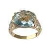 Bague d'occasion  or 750 2 tons topaze traitée sky blue diamants - vue V1