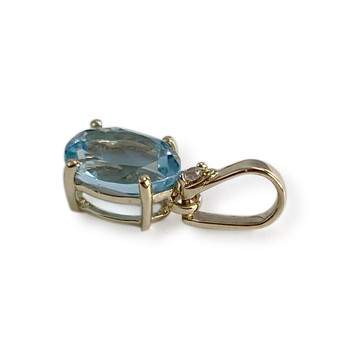 Pendentif d'occasion or 375 jaune topaze bleue traitée zirconia