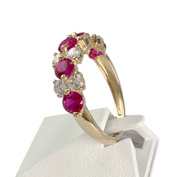 Bague d'occasion or 375 jaune rubis synthétiques et zirconias