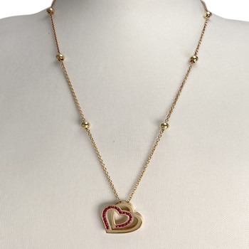 Collier d'occasion or 750 jaune coeurs maille forcat rubis