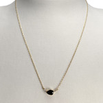 Collier d'occasion or 750 jaune maille forçat diamants grenat - vue 2