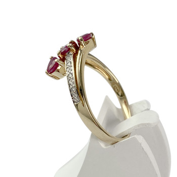 Bague d'occasion  or 375 2 tons rubis diamants
