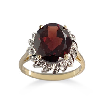 Bague d'occasion 2 ors 750 grenat diamants