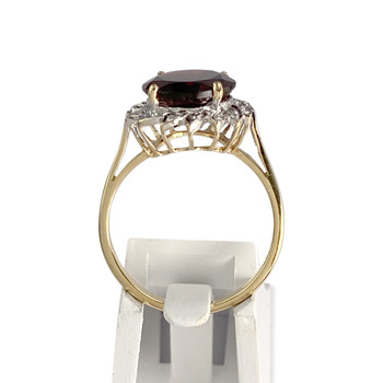 Bague d'occasion 2 ors 750 grenat diamants