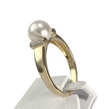 Bague d'occasion  or 750 2 tons diamant perle de culture