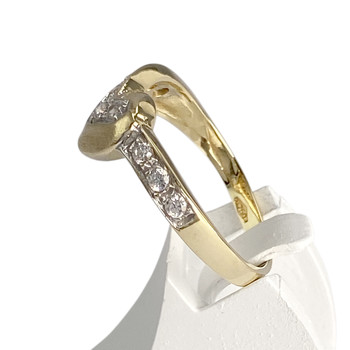 Bague d'occasion 2 ors 750 zirconias