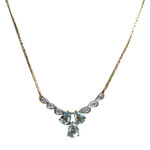 Collier d'occasion  or 750 2 tons maille haricot diamants topazes bleues traitées - vue 1