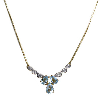 Collier d'occasion  or 750 2 tons maille haricot diamants topazes bleues traitées