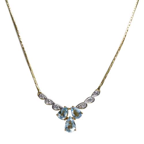 Collier d'occasion  or 750 2 tons maille haricot diamants topazes bleues traitées