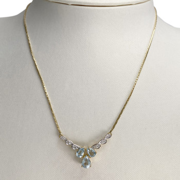 Collier d'occasion  or 750 2 tons maille haricot diamants topazes bleues traitées