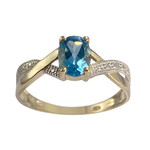 Bague d'occasion  or 750 2 tons topaze bleue traitée - vue 1