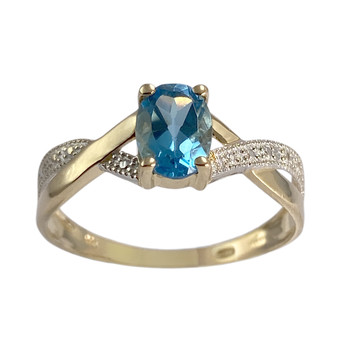 Bague d'occasion  or 750 2 tons topaze bleue traitée