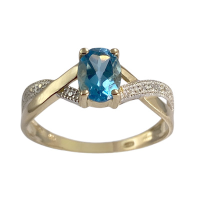 Bague d'occasion  or 750 2 tons topaze bleue traitée - vue 1