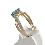 Bague d'occasion  or 750 2 tons topaze bleue traitée - vue 2