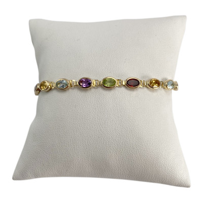 Bracelet d'occasion or 750 jaune citrine topaze grenat peridot amethyste - vue 1