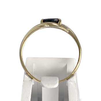 Tweekleurige tweedehands ring van 750 goud met diamanten en saffier