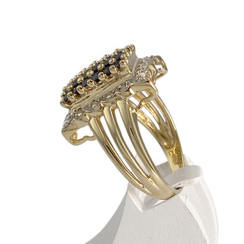 Tweekleurige tweedehands ring van 750 goud met diamanten en saffieren