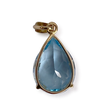 Pre-owned 750 yellow gold pendant with a treated blue topaz