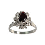 Bague d'occasion or 750 blanc grenat et diamants - vue 1