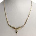Collier d'occasion en or jaune 750, maille anglaise, diamants et saphir - vue 2