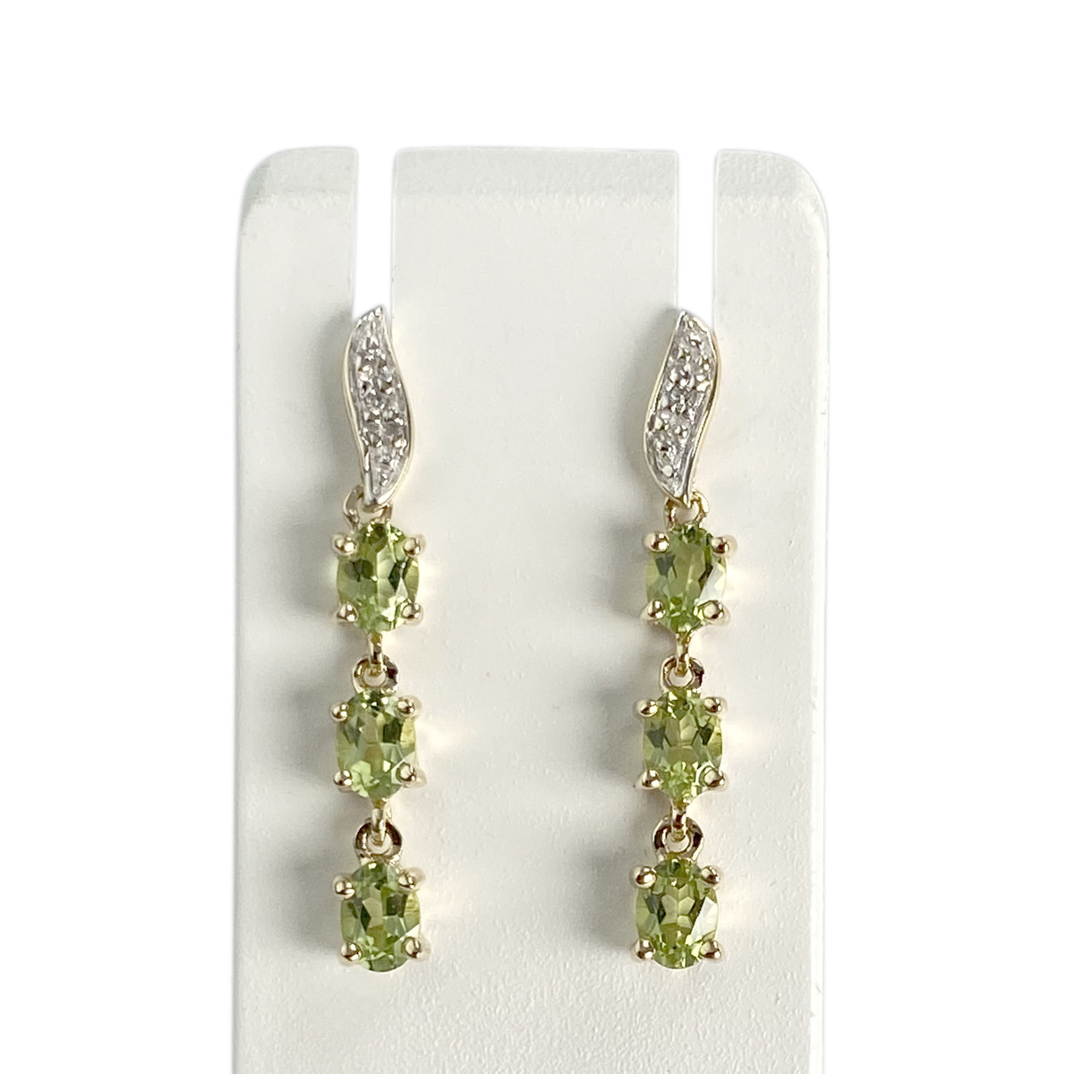 Boucles d'oreilles d'occasion 2 ors 375 diamants péridots