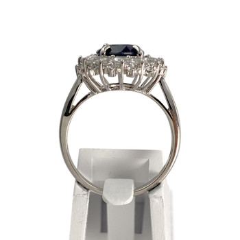 Tweedehands ring van 375 witgoud met saffier en zirkonia’s