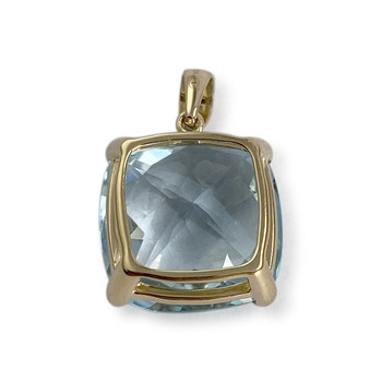 Pre-owned 750 yellow gold pendant with a treated blue topaz