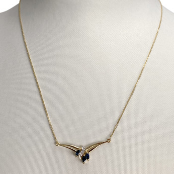 Pre-owned 14K yellow gold necklace with diamonds and sapphires
