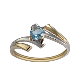 Pre-owned solitaire ring, 750 gold, two-tone, with a treated blue topaz