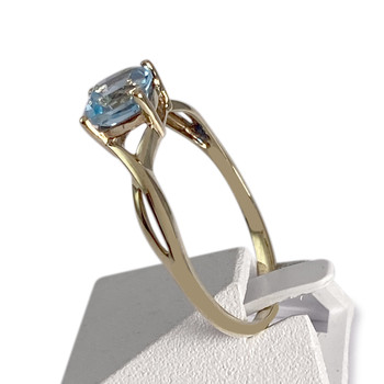 Bague d'occasion or 375 jaune topaze bleue traitée