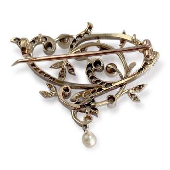 Tweekleurige tweedehands broche van 750 goud met diamant en gekweekte parel