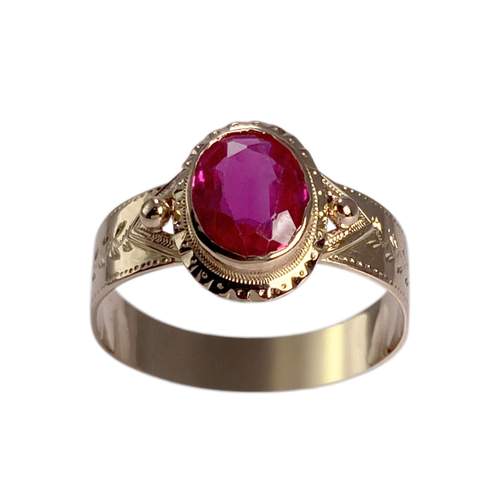 Bague d'occasion or 750 jaune rubis synthetique