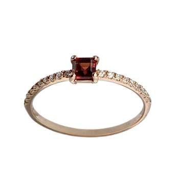 Pre-owned 375 rose gold ring with a diamond and garnet