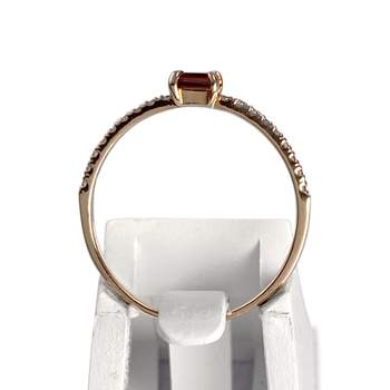 Pre-owned 375 rose gold ring with a diamond and garnet