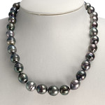 Collier d'occasion or 750 jaune perle de tahiti - vue 2