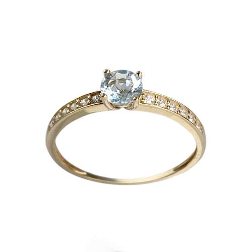 Bague d'occasion or 750 jaune zirconias et topaze bleue
