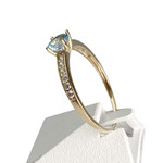 Bague d'occasion or 750 jaune zirconias et topaze bleue - vue 2